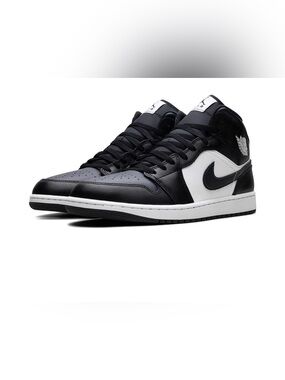 Jordan Black and White Mid-Top Sneakers